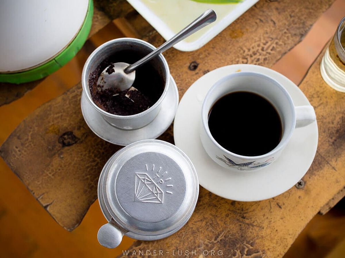 A traditional phin, Vietnamese coffee filter, at a cafe in Dalat, Vietnam.