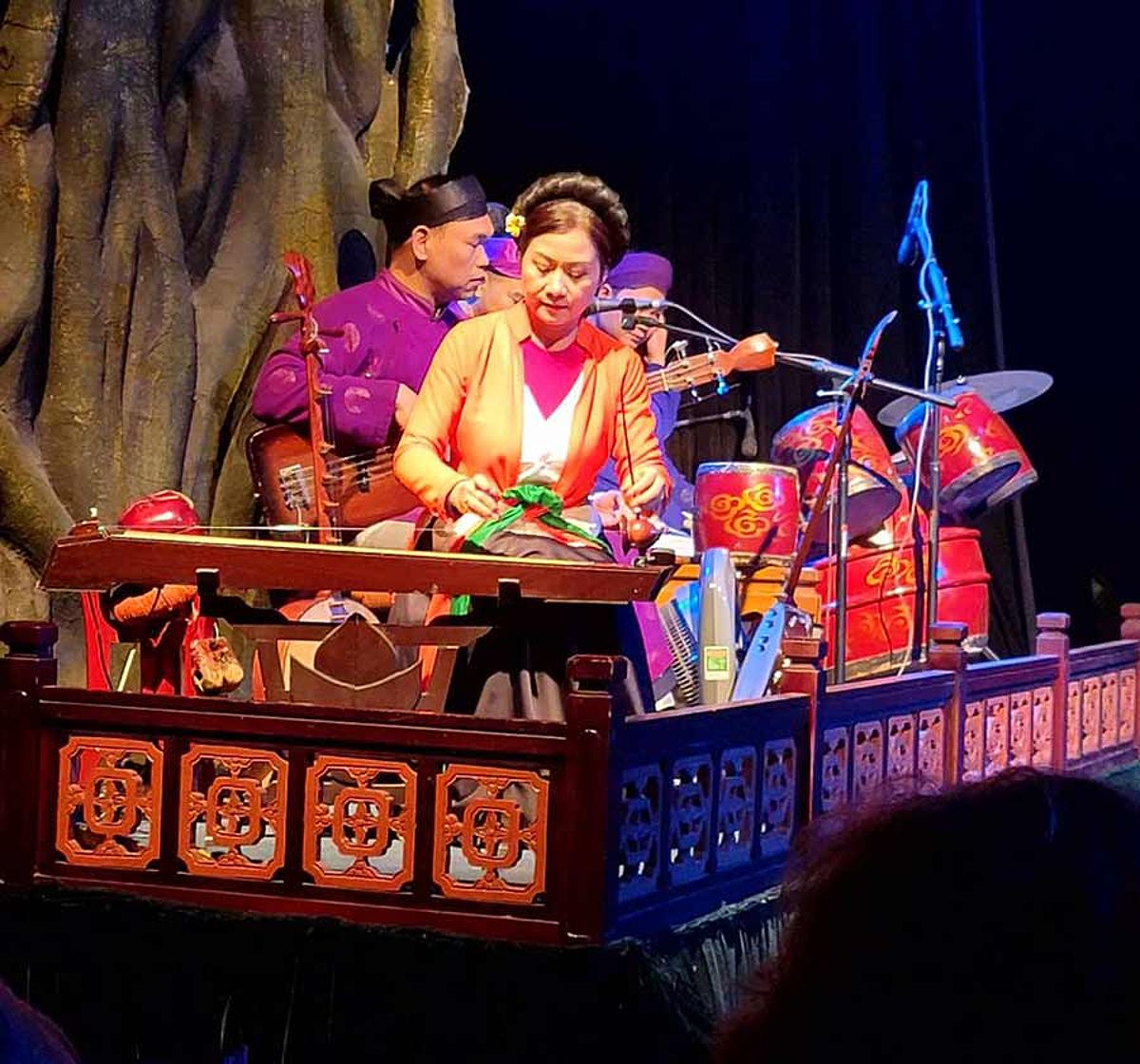 Musicians performing live during the water puppet show in Hanoi