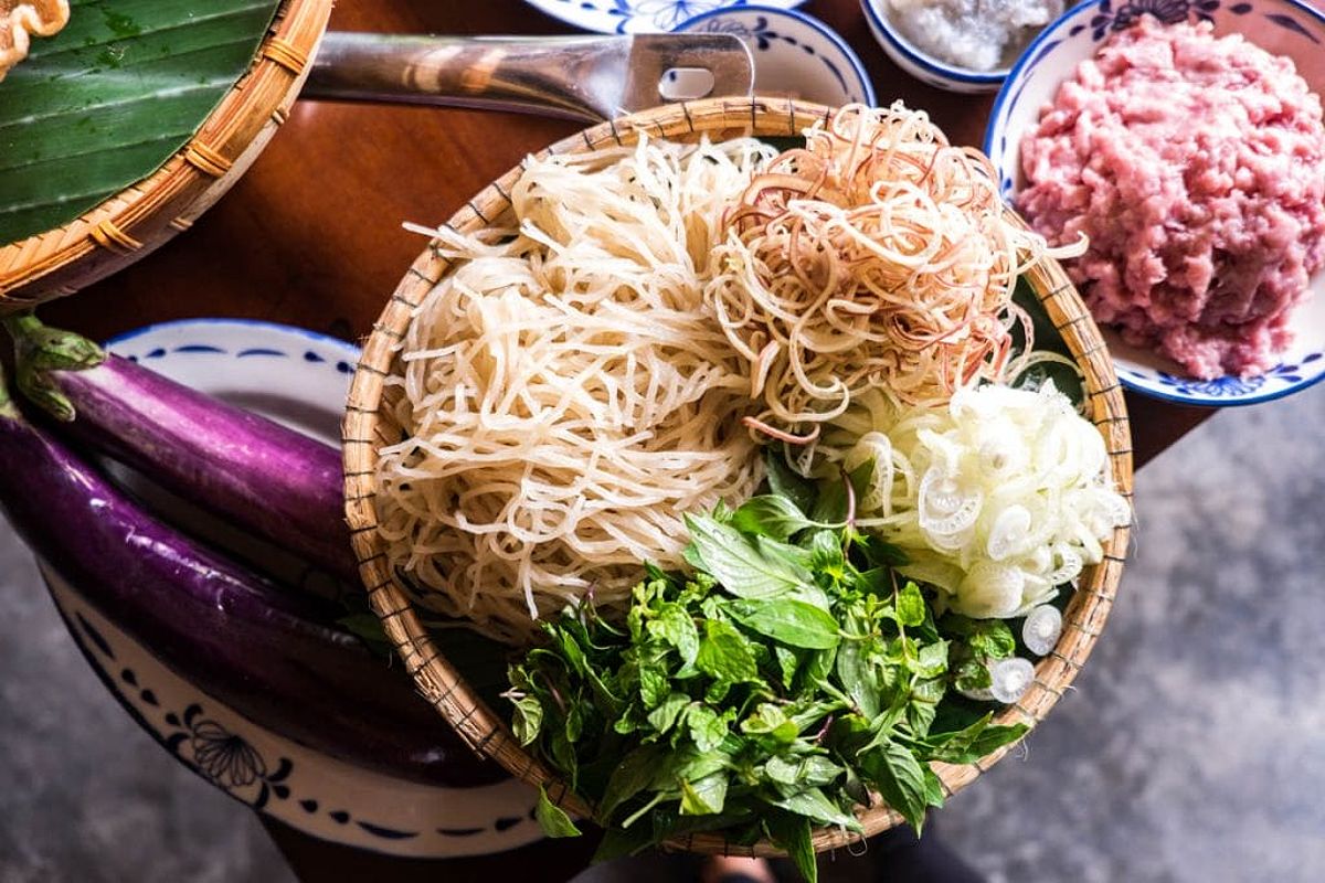Various noodles and vegetables in cooking class Hoi An